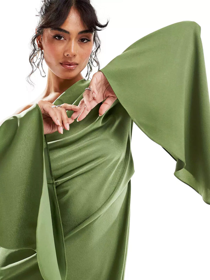 Green satin dress with bold one-shoulder