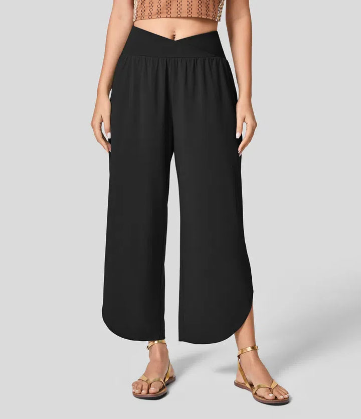 Breezeful™ crossover pants with high waistband and pleated side pockets